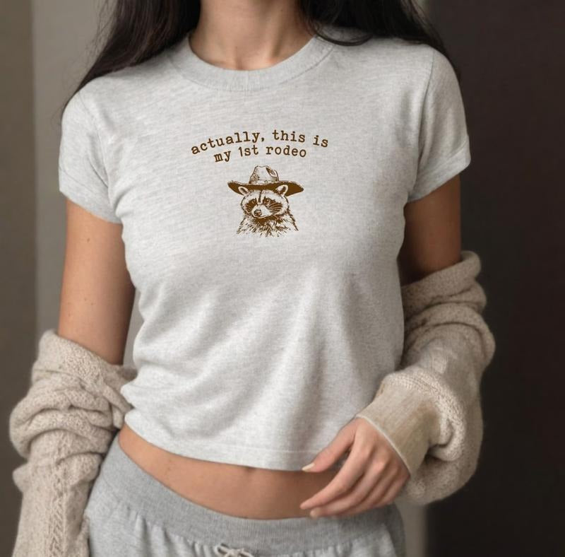 Actually This Is My 1st Rodeo Baby Tee, Cute Funny Raccoon Baby Tee, Raccoon Western T-Shirt, Y2K Baby Tee Hoodie, Sweatshirt