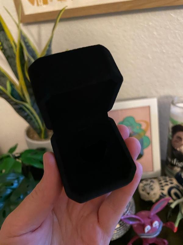 Add a ring box (ring not included!).