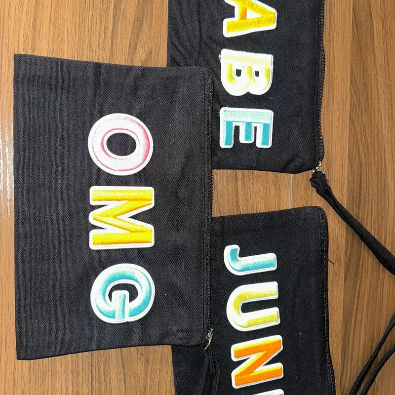 Adorable Black Wristlet Bag with bright patches