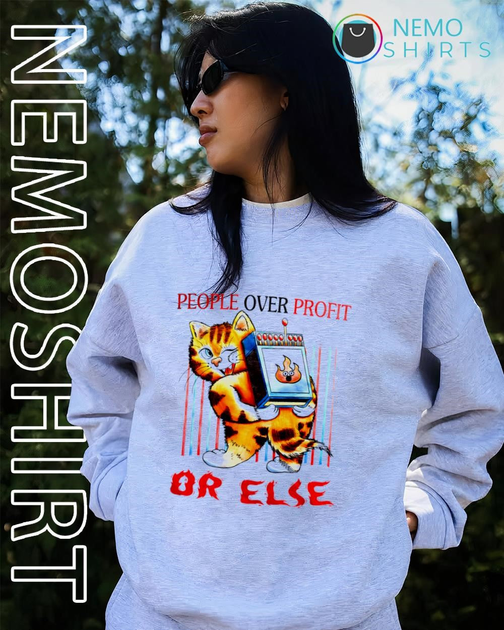 Cat carrying giant matchbox people over profit or else shirt