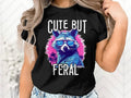 Cute But Feral T Shirt Hoodie Sweater, Quirky Raccoon Design, Trendsetters, Stylish Sunglasses, Casual Outings, Vibrant...