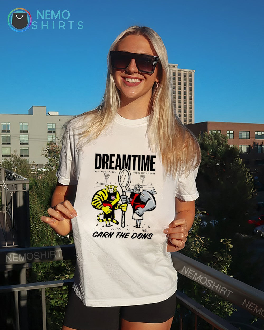 Dreamtime mascots Richmond Tigers and Essendon Bombers carn the dons shirt