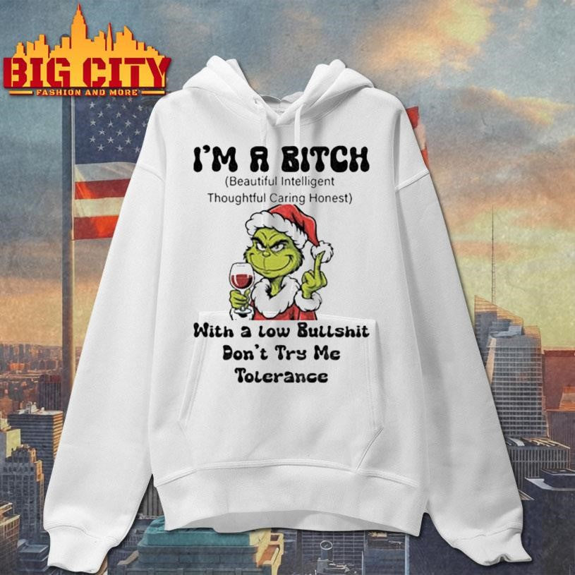 Grinch Santa hat middle finger I’m a bitch with a low bullshit don’t try me tolerance Christmas shirt