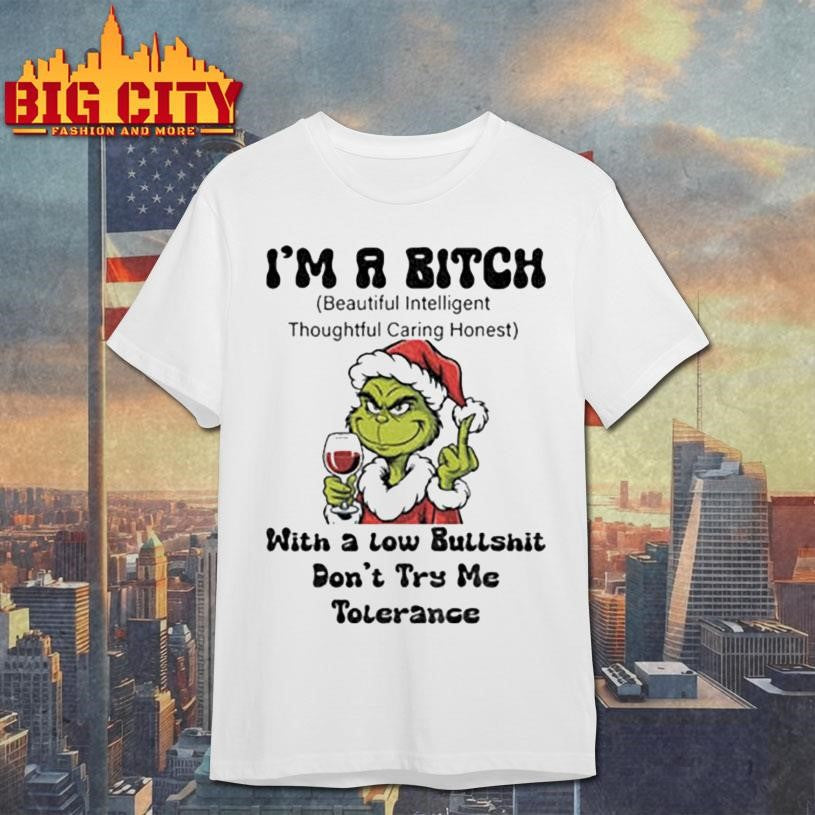 Grinch Santa hat middle finger I’m a bitch with a low bullshit don’t try me tolerance Christmas shirt