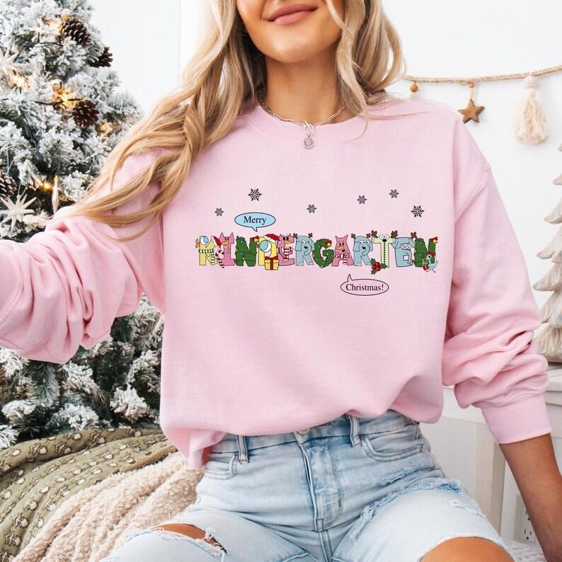 Kindergarten Teacher Christmas Sweatshirt, Elephant And Piggie Christmas T-shirt, Santa's Favorite Teacher Shirt,...