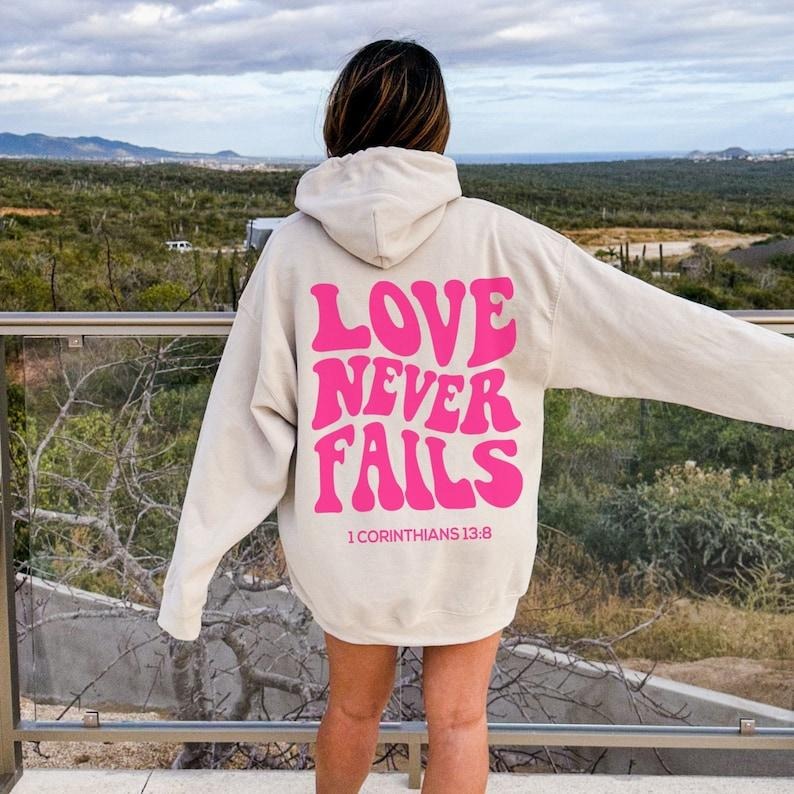 Love Never Fails Hoodie, Bible Verse Christian Hoodie, Preppy Christian Sweatshirt, Trendy Sweatshirts, Bible Verse...