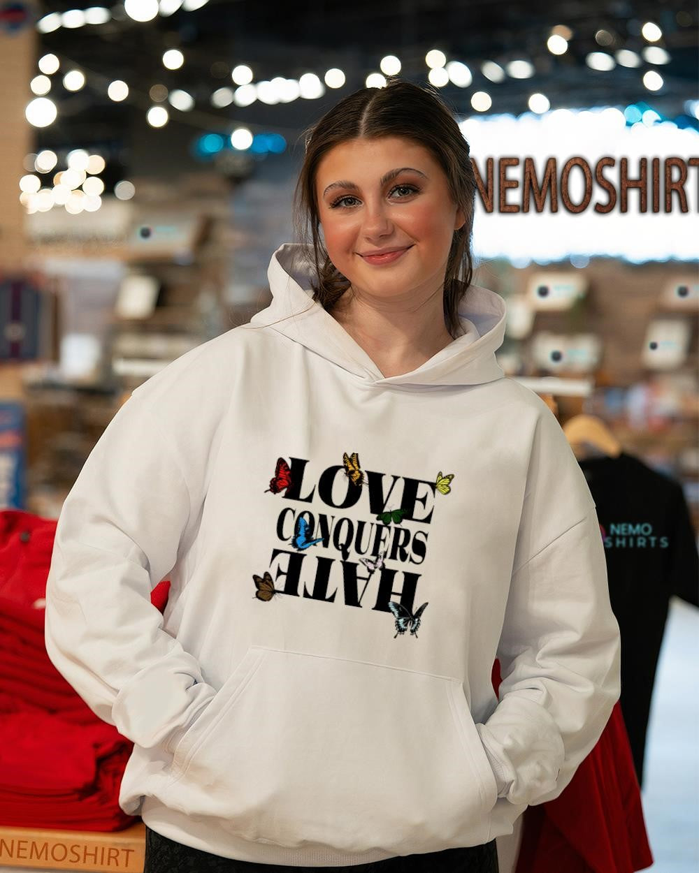 Love conquers hate butterflies graphic shirt