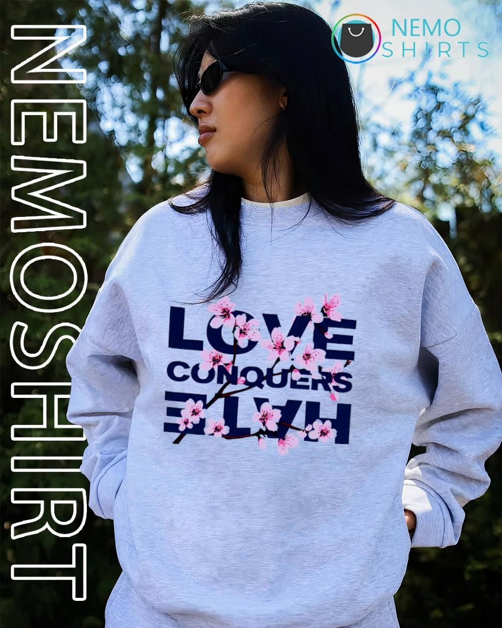 Love conquers hate cherry blossom graphic shirt