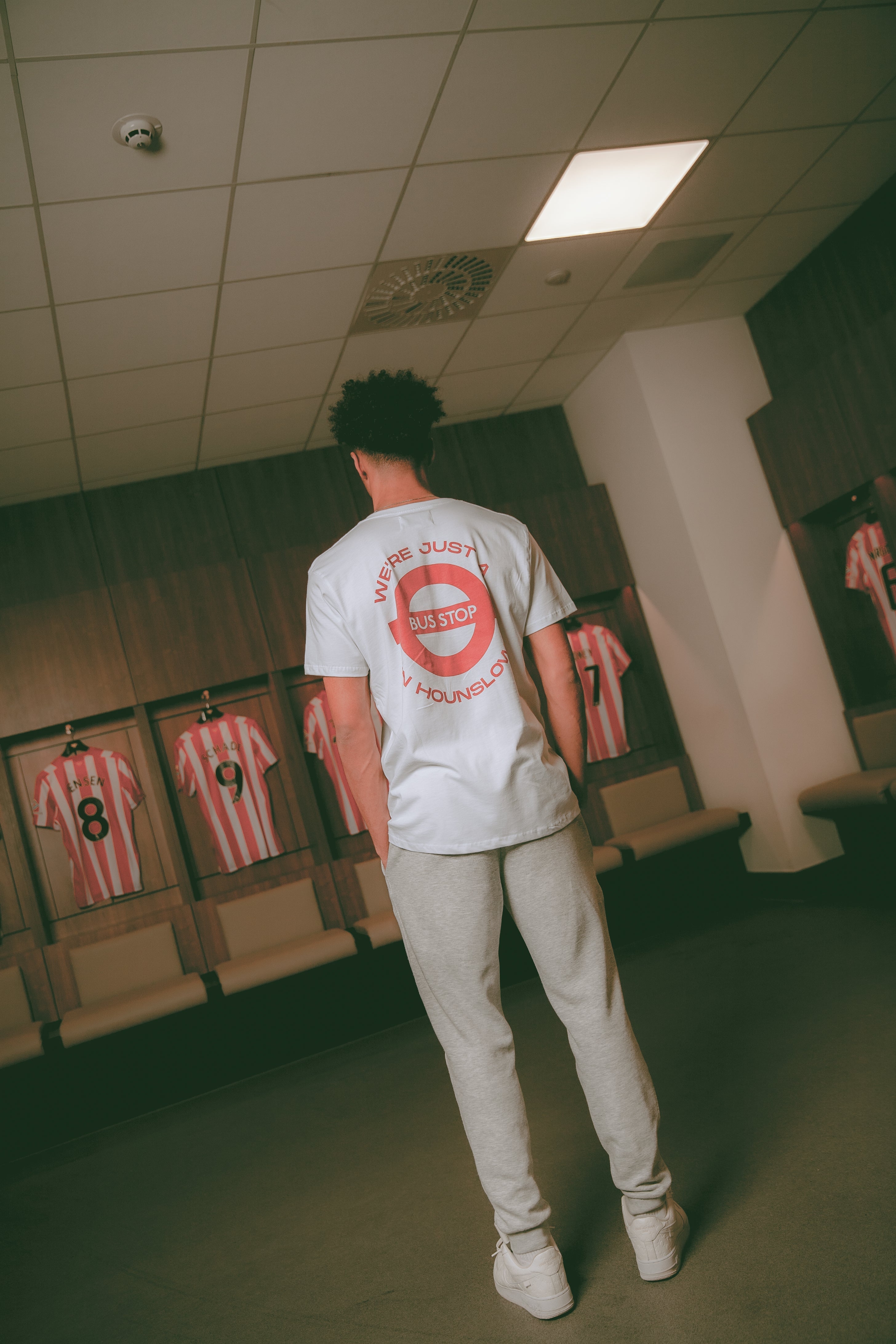 Brentford x AOF Just A Bus Stop Tee Hoodie, Sweatshirt | CiraTrend.com (Image 5)