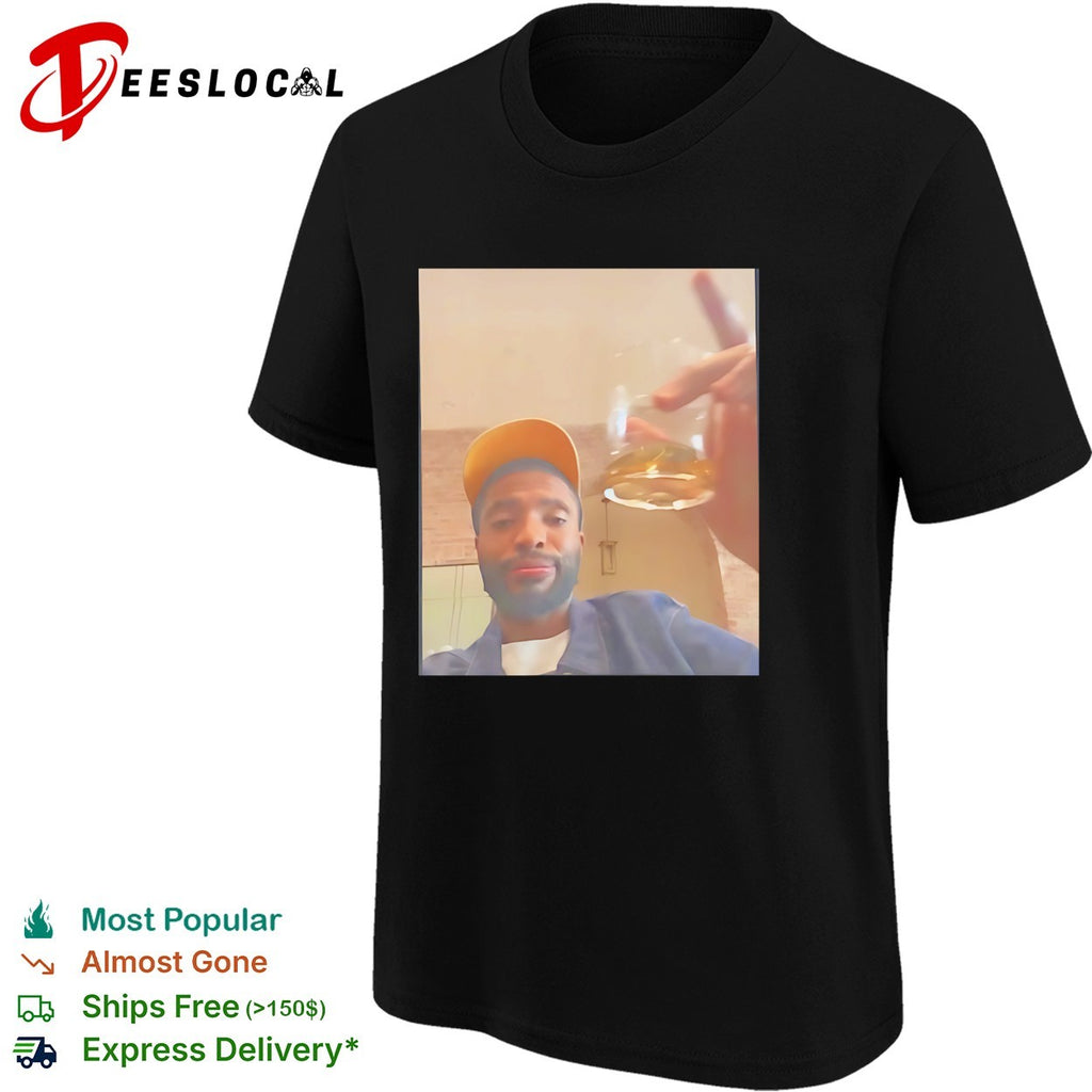 Mikal Bridges Live yellow cap holding a glass of liquor shirt