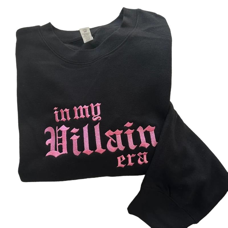 PINK In My Villain Era TM Embroidered Crewneck Sweatshirt Unisex Womenswear T-Shirts, Hoodie | CiraTrend.com