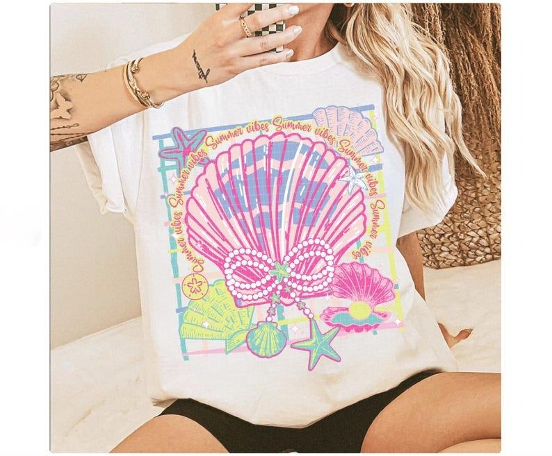 Pearl Bow Seashell Clam Bow Tshirt, Coquette Pearl Bow,Pink Clam , Summer Beach Tshirt Hoodie, Sweatshirt | CiraTrend.com