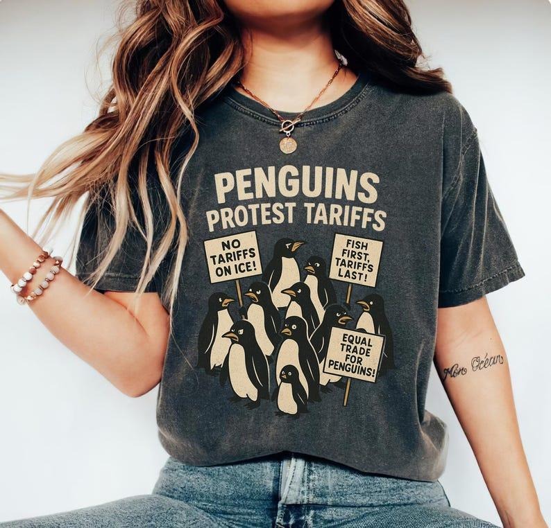 Penguins Protest Tariffs Shirt, Funny Tariffs Shirt, Funny Penguin Graphic Tee Hoodie, Sweatshirt | CiraTrend.com