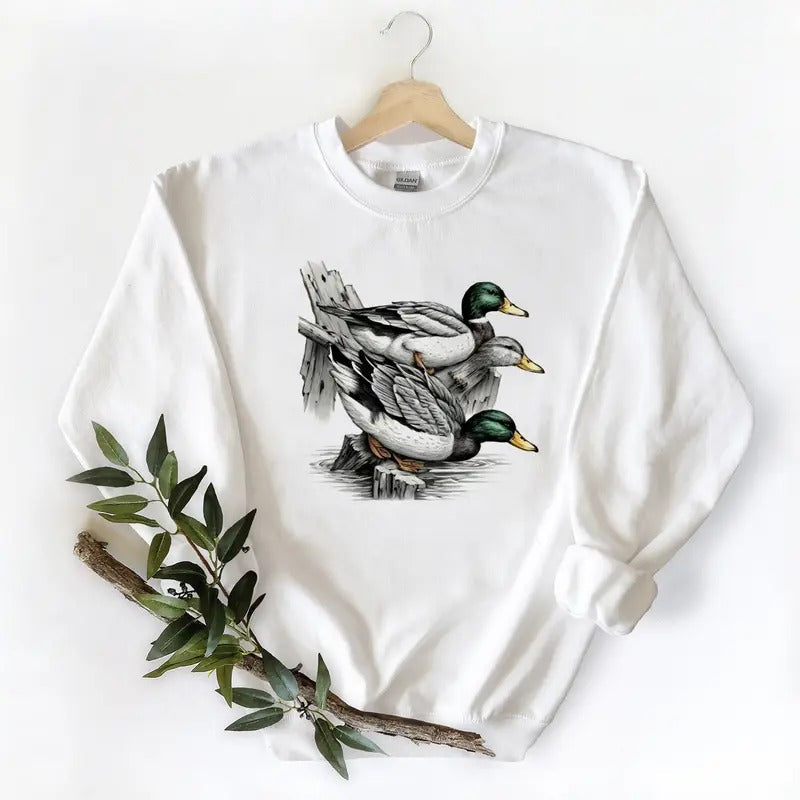 Small Mallard Ducks Coming Over Big Timbers Onto Water Unisex Tshirt Sweatshirt Hoodie, for duck hunters, husbands and Mallard duck lovers Cotton Womenswear