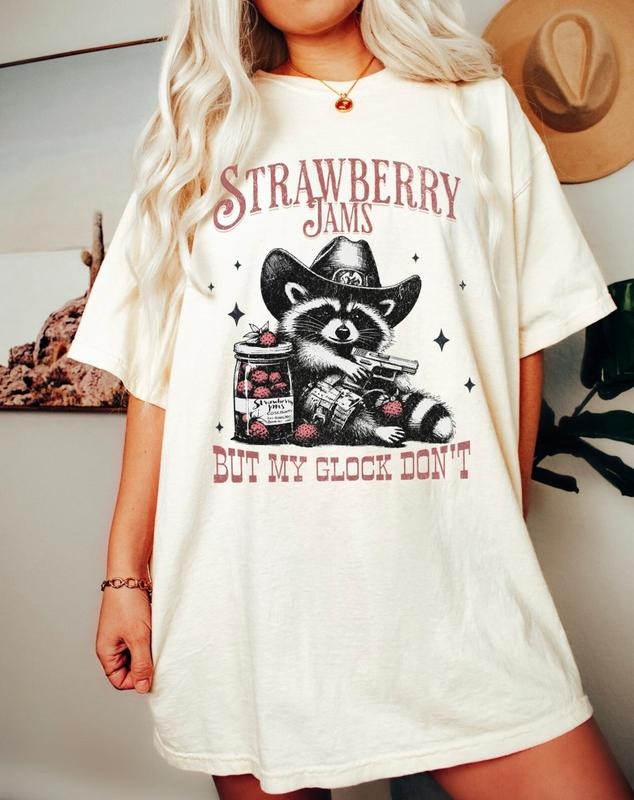 Strawberry Jams But My Glock Don't Funny Raccoon Shirt, Raccoon Meme Tee Hoodie, Sweatshirt | CiraTrend.com