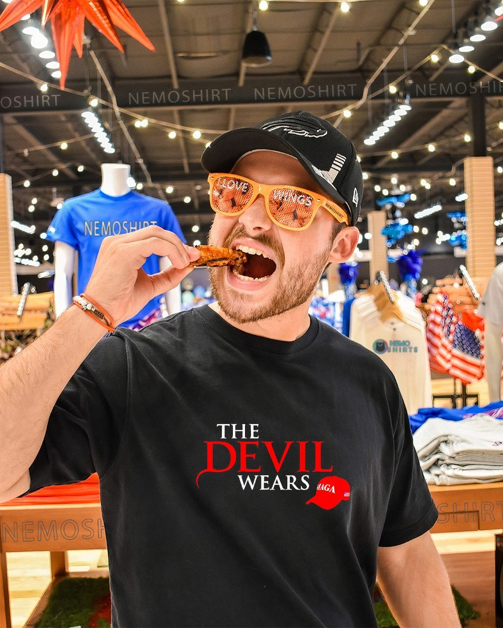 The devils wears Maga hat shirt