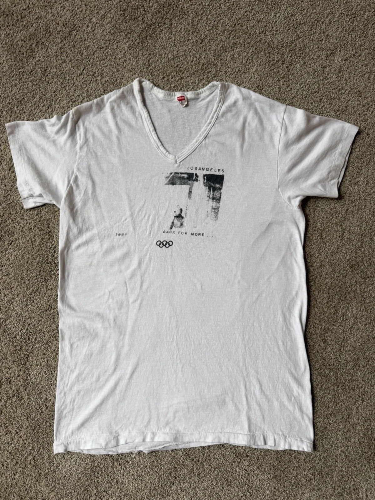 Vintage 1984 Olympics V Neck Tee Shirt. Size Men’s Large.