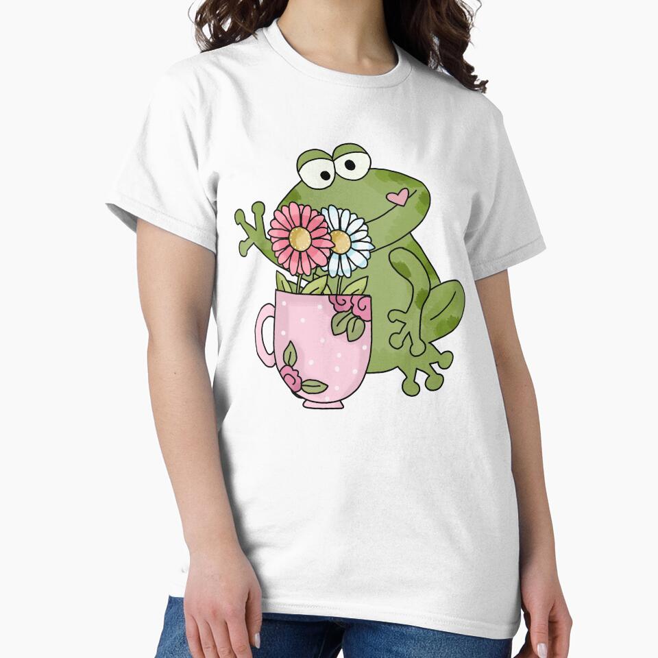 Cottagecore aesthetic cute frog holding flowers and a cup by HopItStudio