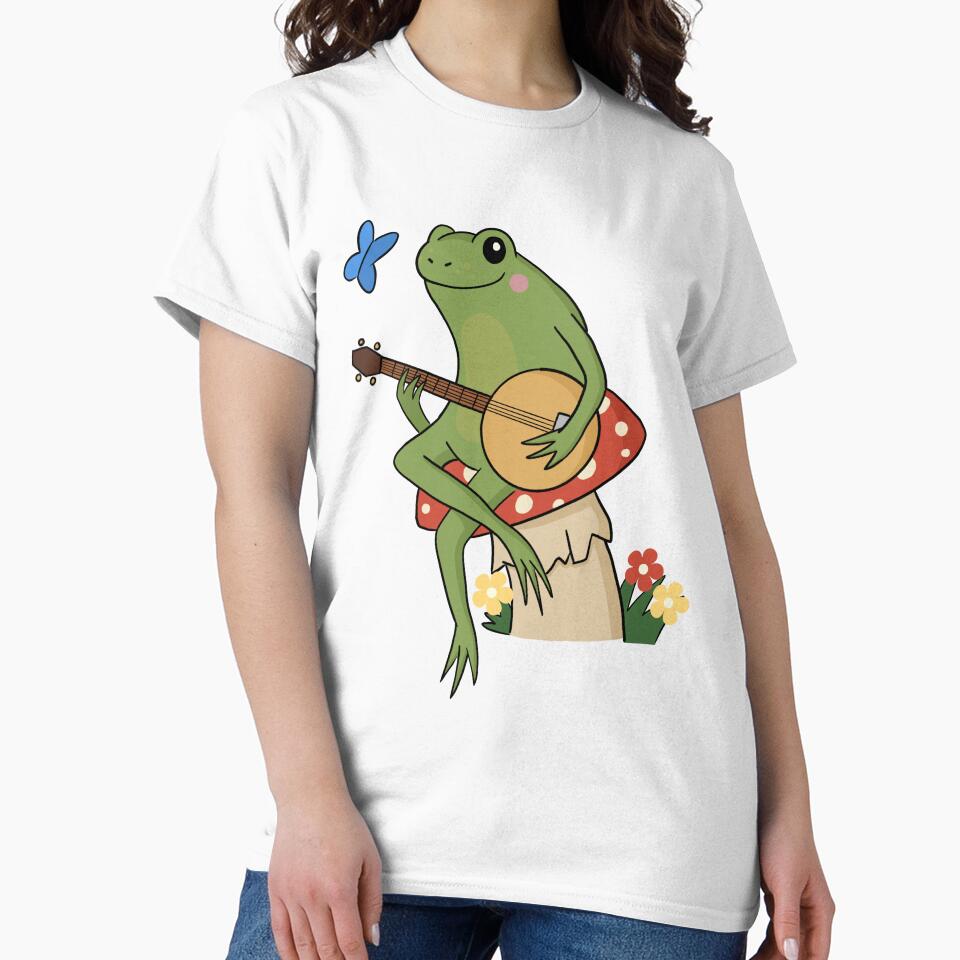 Cottagecore aesthetic cute frog playing a banjo sitting on a mushroom by HopItStudio
